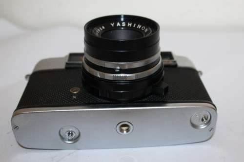 Yashica *J* 35mm Camera....Shutter Fires...Good Cosmetic Condition