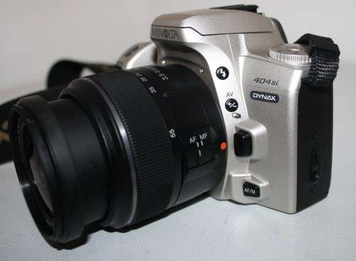 ** Minolta 404si** Sony..DT 3.5-5.6/18-55 SAM Lens...Working..Excellent  Condition