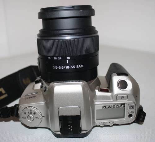 ** Minolta 404si** Sony..DT 3.5-5.6/18-55 SAM Lens...Working..Excellent  Condition