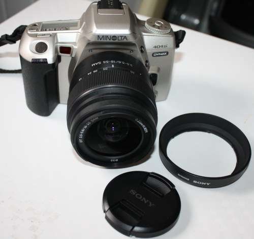 ** Minolta 404si** Sony..DT 3.5-5.6/18-55 SAM Lens...Working..Excellent  Condition