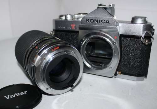 **Konica**AutoReflex T3 S.L.R. Film 35mm Camera...Camera Excellent Condition.