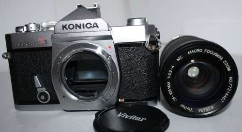 **Konica**AutoReflex T3 S.L.R. Film 35mm Camera...Camera Excellent Condition.