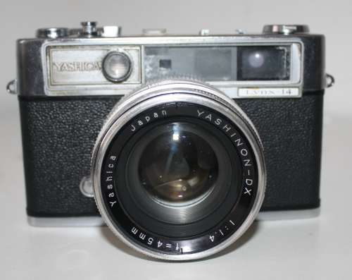 ** Yashica Lynx**Camera Good Condition....Shutter Fires...Shutter"Blades" not closing.Lens Clean.