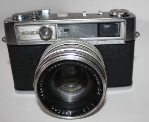 ** Yashica Lynx**Camera Good Condition....Shutter Fires...Shutter"Blades" not closing.Lens Clean.