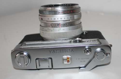 ** Yashica Lynx**Camera Good Condition....Shutter Fires...Shutter"Blades" not closing.Lens Clean.