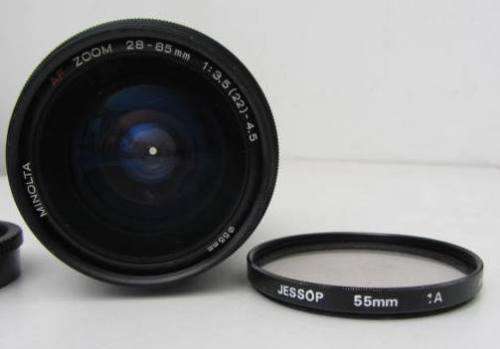 **Minolta AF Zoom 28-85mm 1:3.5(22)-4.5 Lens-Heavy**Including Olympus 0.8x Wide Conversion Lens.