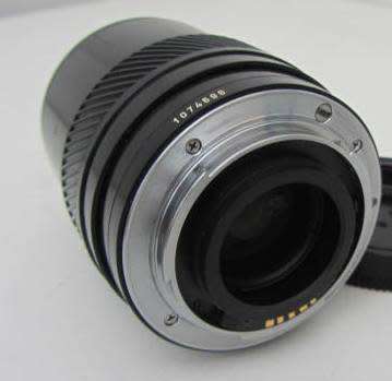 **Minolta AF Zoom 28-85mm 1:3.5(22)-4.5 Lens-Heavy**Including Olympus 0.8x Wide Conversion Lens.