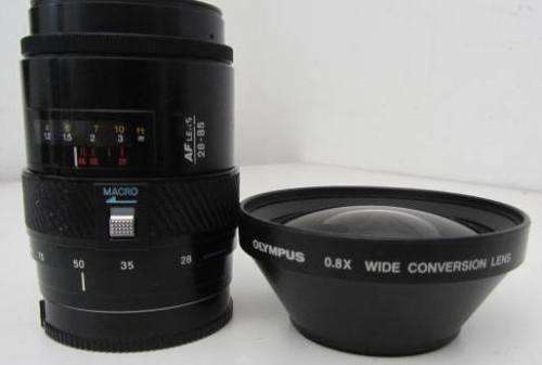 **Minolta AF Zoom 28-85mm 1:3.5(22)-4.5 Lens-Heavy**Including Olympus 0.8x Wide Conversion Lens.