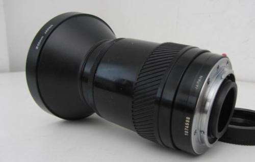 **Minolta AF Zoom 28-85mm 1:3.5(22)-4.5 Lens-Heavy**Including Olympus 0.8x Wide Conversion Lens.