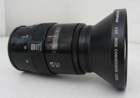 **Minolta AF Zoom 28-85mm 1:3.5(22)-4.5 Lens-Heavy**Including Olympus 0.8x Wide Conversion Lens.