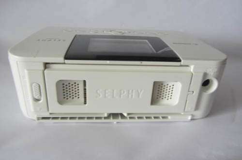 **Canon Selphy-CP-1000**Compact Photo Printer-Including Three Packs Printing Paper.