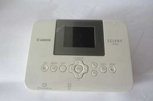 **Canon Selphy-CP-1000**Compact Photo Printer-Including Three Packs Printing Paper.