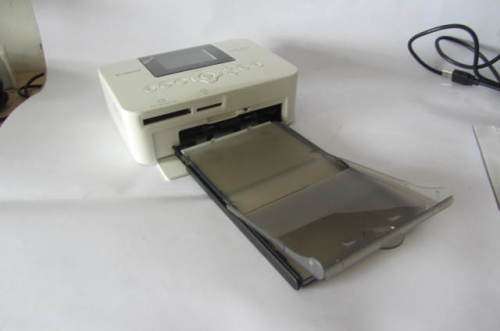 **Canon Selphy-CP-1000**Compact Photo Printer-Including Three Packs Printing Paper.