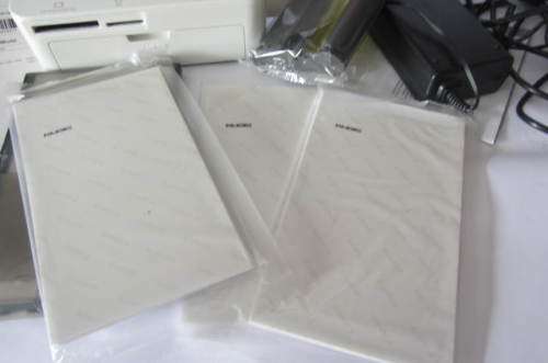 **Canon Selphy-CP-1000**Compact Photo Printer-Including Three Packs Printing Paper.