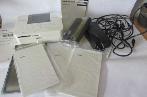 **Canon Selphy-CP-1000**Compact Photo Printer-Including Three Packs Printing Paper.