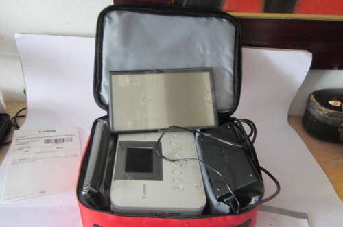 **Canon Selphy-CP-1000**Compact Photo Printer-Including Three Packs Printing Paper.