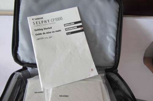 **Canon Selphy-CP-1000**Compact Photo Printer-Including Three Packs Printing Paper.