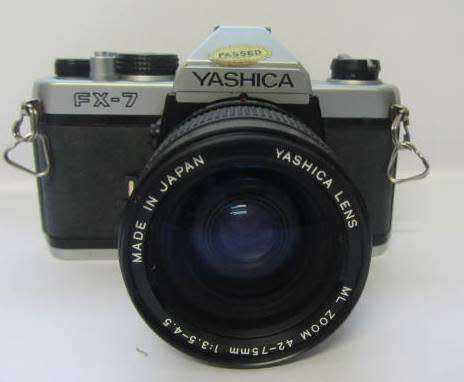 **Yashica FX-7** Yashica ML Zoom 42-75mm 1:3.5-4.5 Lens..Incl UV Haze Filter and Bag