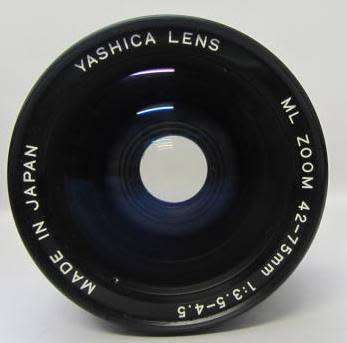 **Yashica FX-7** Yashica ML Zoom 42-75mm 1:3.5-4.5 Lens..Incl UV Haze Filter and Bag