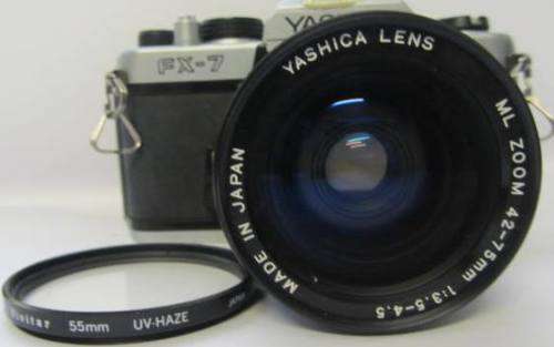 **Yashica FX-7** Yashica ML Zoom 42-75mm 1:3.5-4.5 Lens..Incl UV Haze Filter and Bag