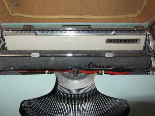 **Typewriter** Olivette Lettera 22....Good Condition...Needs new Lint..Incl Carrying Case