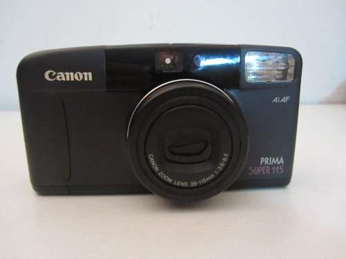 **Canon Prima Super 115**35mm Film Camera..Canon Zoom 38-115mm 3.6-8.5.Lens.Good  Condi