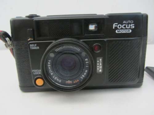**Yashica Auto Focus**35mm Camera..Good Cosmetic Condition...Flash not firing..Shutter Fires.