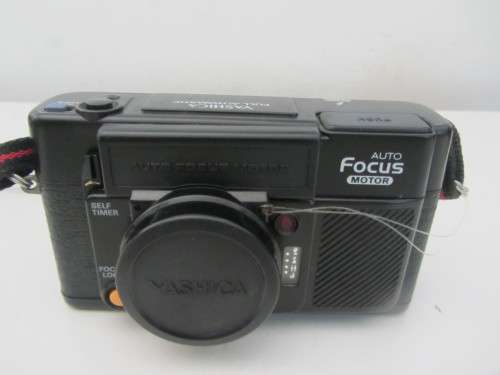 **Yashica Auto Focus**35mm Camera..Good Cosmetic Condition...Flash not firing..Shutter Fires.
