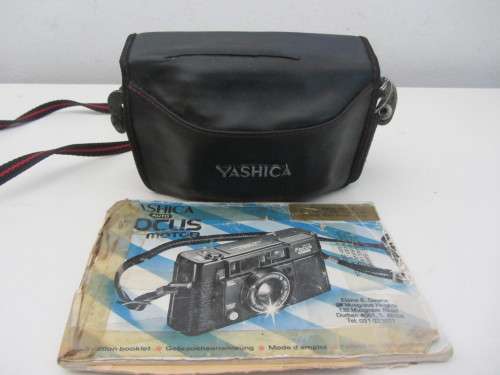 **Yashica Auto Focus**35mm Camera..Good Cosmetic Condition...Flash not firing..Shutter Fires.