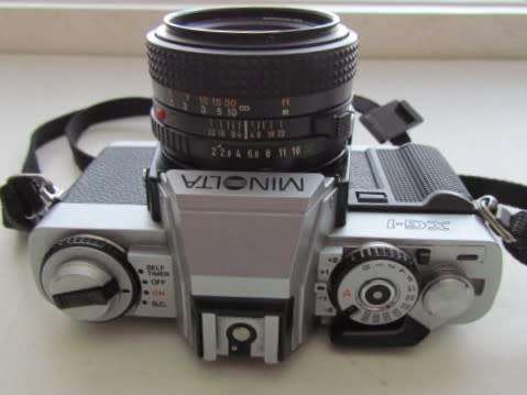 **Minolta XG-1**Minolta MD 50mm 1:2 Lens Plus Panagor PMC Auto Zoom f=3.5 100mm Lens.