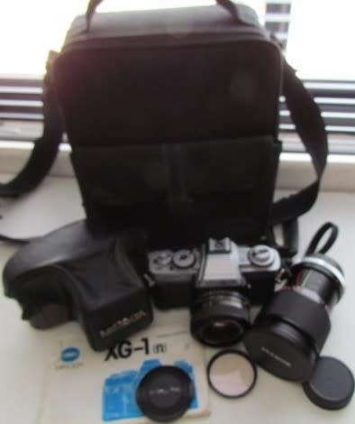 **Minolta XG-1**Minolta MD 50mm 1:2 Lens Plus Panagor PMC Auto Zoom f=3.5 100mm Lens.