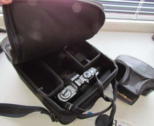 **Minolta XG-1**Minolta MD 50mm 1:2 Lens Plus Panagor PMC Auto Zoom f=3.5 100mm Lens.