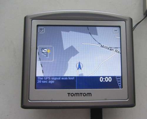 Tom Tom GPS -Tom Tom Charger -As per Photos
