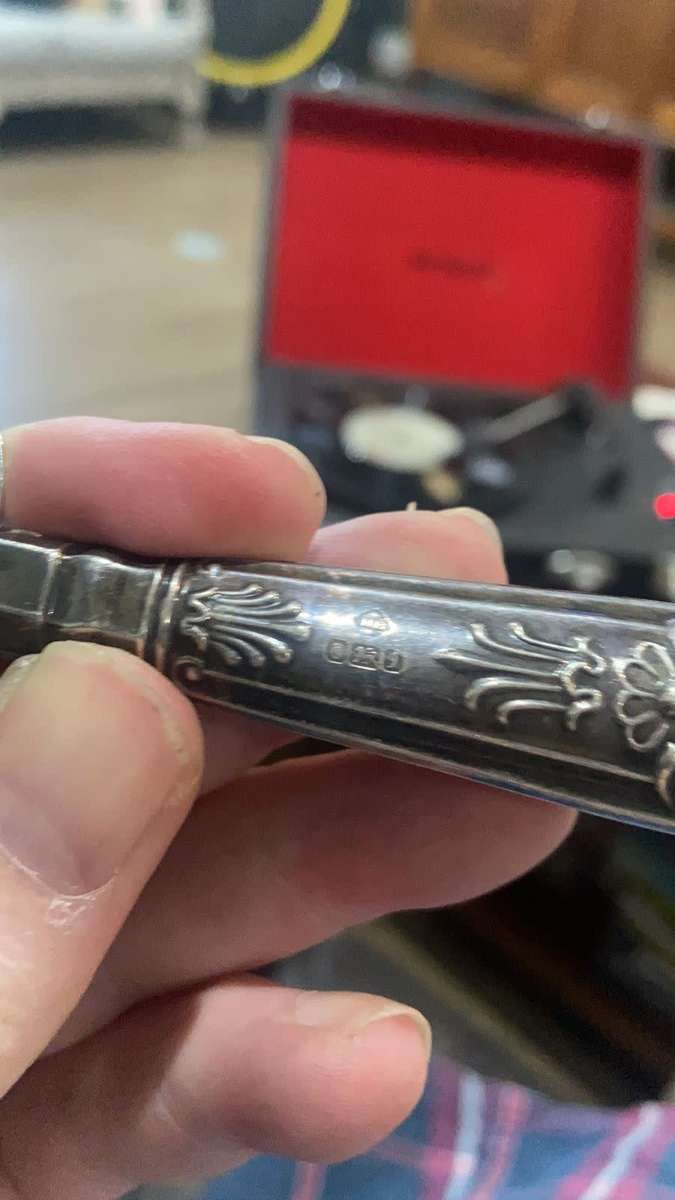 Silver cake lifter and serviette ring