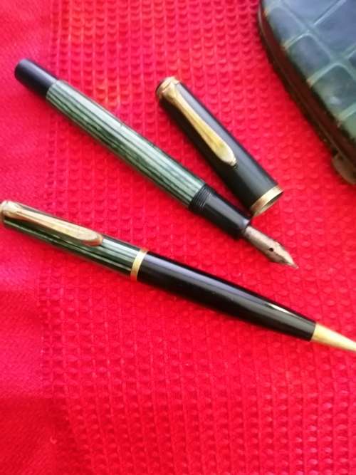A set of vintage Pelikan pens in case