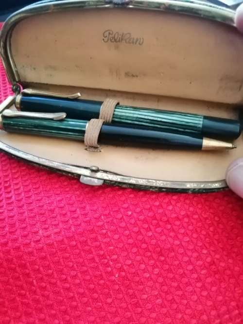 A set of vintage Pelikan pens in case