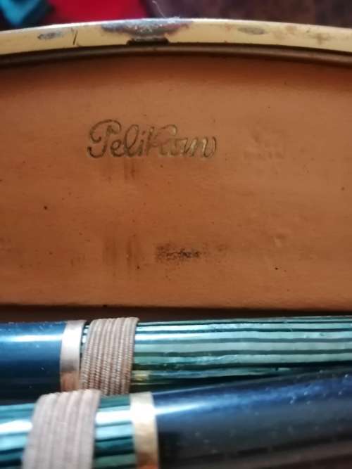 A set of vintage Pelikan pens in case