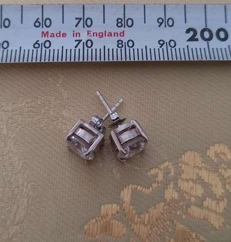 PAIR OF LARGE ROUND WHITE CZ EAR STUDS SET IN STERLING SILVER