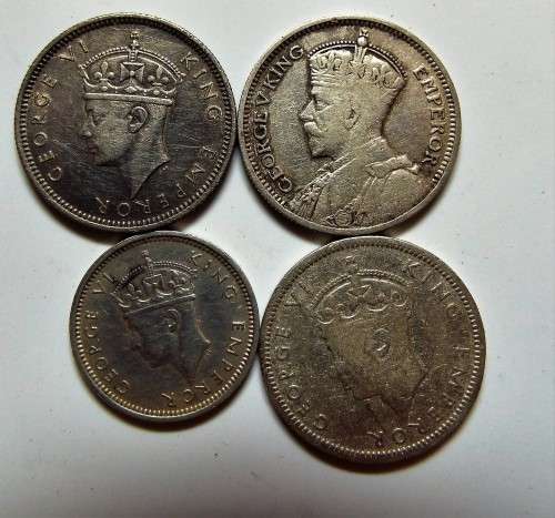 NICE 4 x sothern rhodesea coins ,,,,, SILVER