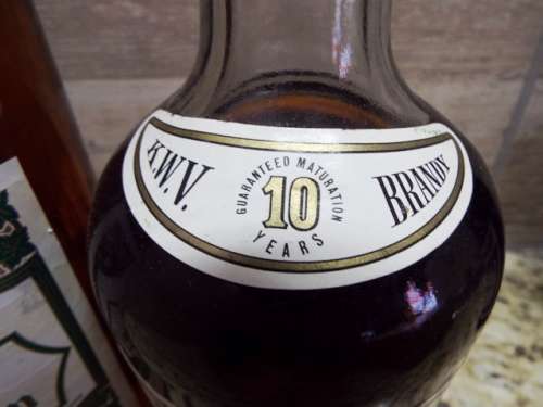 SUPER SUPER RARE 3 ,5 AND 10 YEAR K W V brandy sealed bottle ,,,BOTTLED IN THE 1970s,