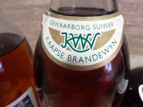 SUPER SUPER RARE 3 ,5 AND 10 YEAR K W V brandy sealed bottle ,,,BOTTLED IN THE 1970s,