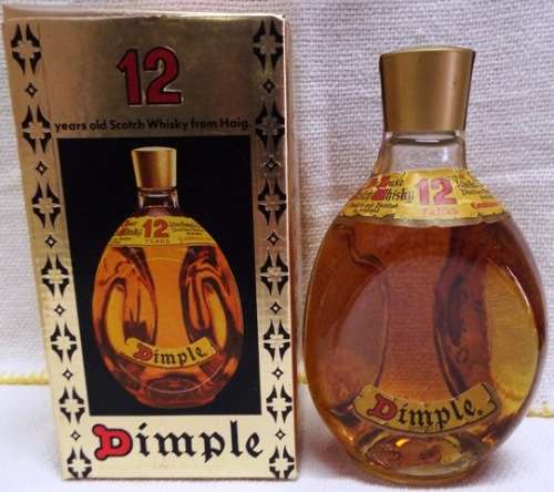 SUPER RARE ,,12 YEARS OLD DIMPLE sealed bottle ,,,BOTTLED IN THE 1970s,