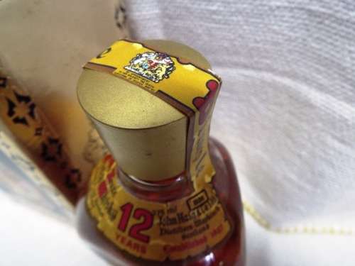 SUPER RARE ,,12 YEARS OLD DIMPLE sealed bottle ,,,BOTTLED IN THE 1970s,