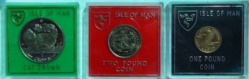 ISLE OF MAN COIN SET ,,1 POUND ,2 POUND AND CAT CROWN