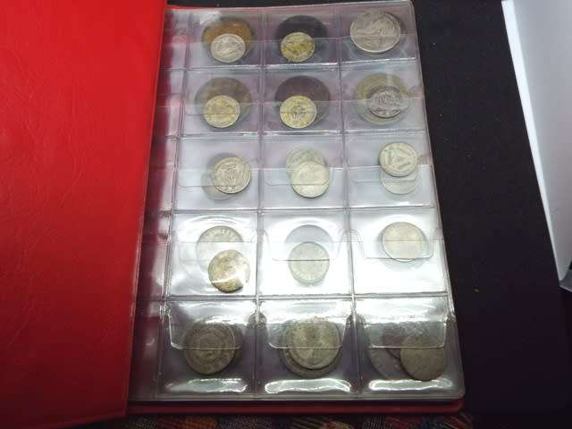 coin album with 60  coins at R1 start about 1/2 silver