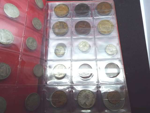 coin album with 60  coins at R1 start about 1/2 silver