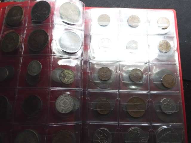 coin album with 60  coins at R1 start about 1/2 silver