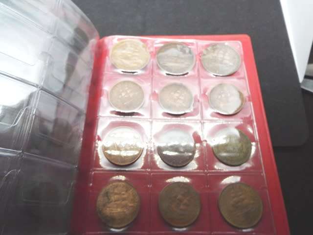 coin album with 60  coins at R1 start about 1/2 silver