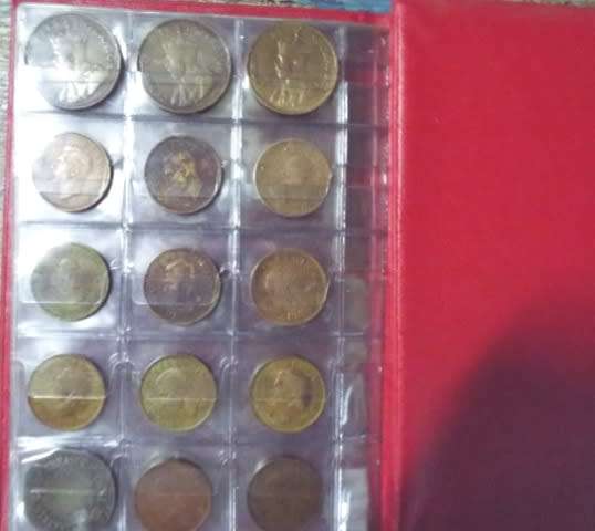 coin album with 60  coins at R1 start about 1/2 silver