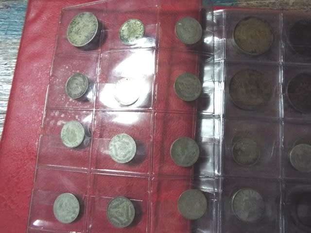 coin album with 60  coins at R1 start about 1/2 silver